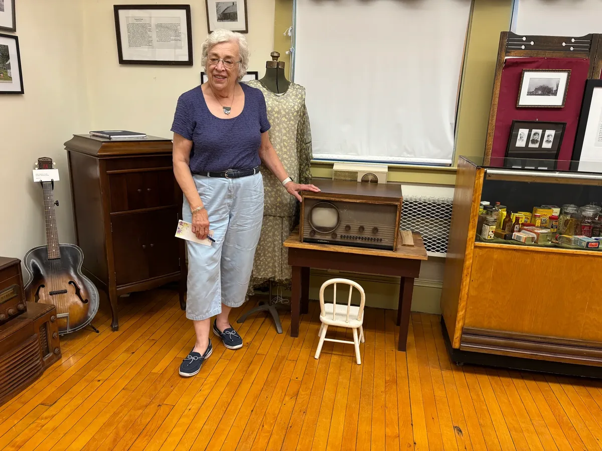 The Homestead Life display with its vintage television set and radio cabinet