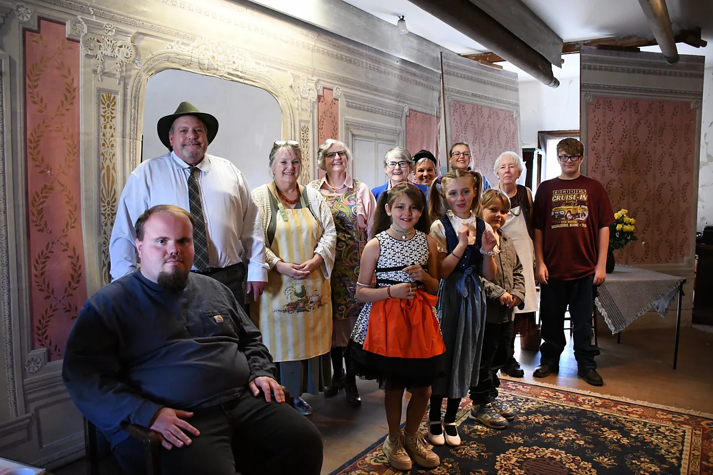 Members of the company gathered together for a group photograph