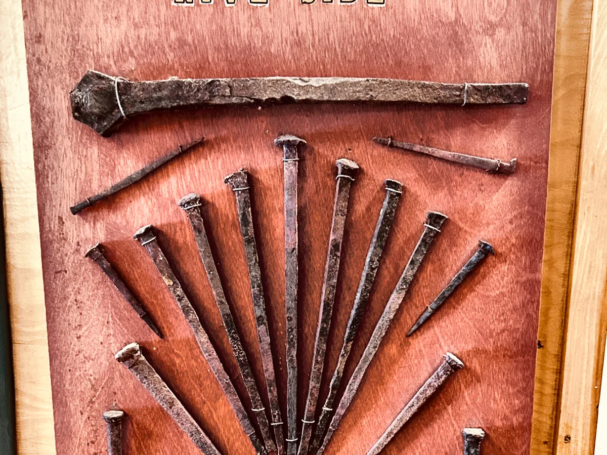 Display board of hand forged nails and a spike from the First Congregational Church at Riverside