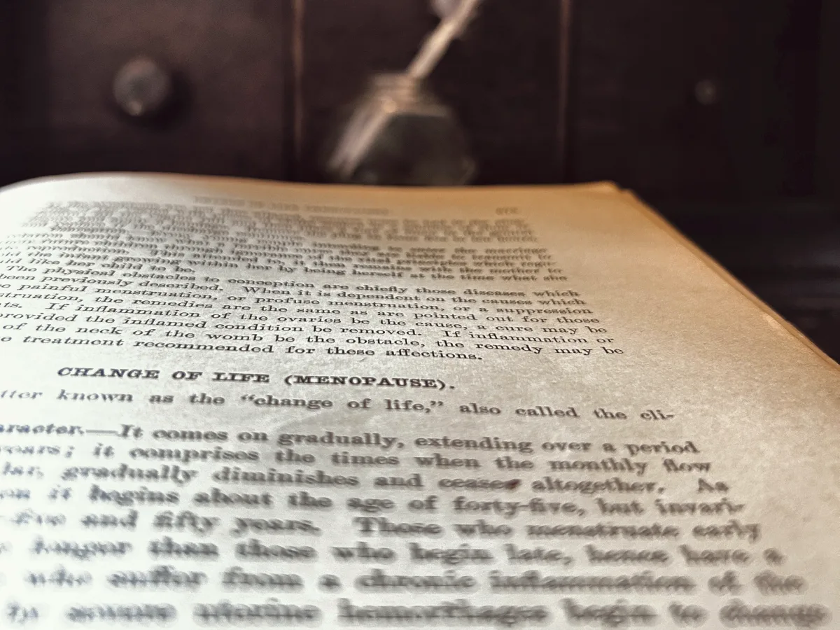 Open page of a period home medical book headed Change of Life