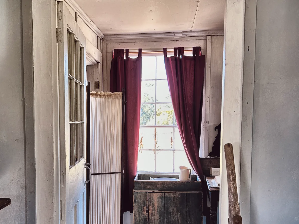 Doorway with a painted sign reading Doctor above it